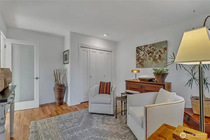 One of two spacious bedrooms but this one has the stair access to the lush backyard and the owners use it as a meditation room.