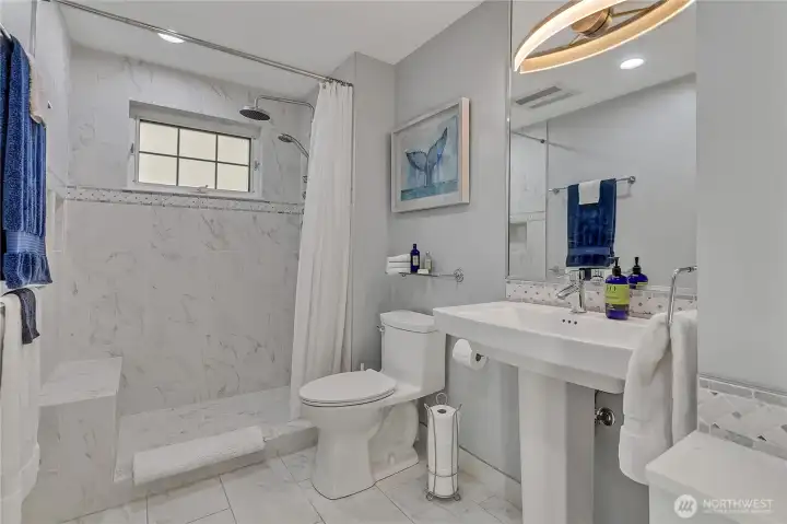 Not shown, is a built-in cabinet and make-up station on the right.