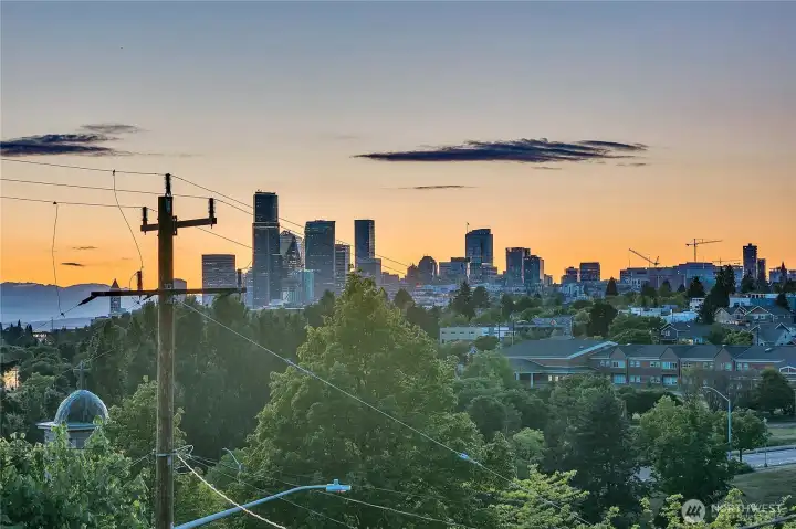 Gorgeous City Skyline, Olympic Mountain and Puget Sound views are picture perfect from the living room, front deck, dining and kitchen area.