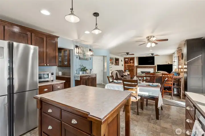 The kitchen opens to the secondary dining and living room.
