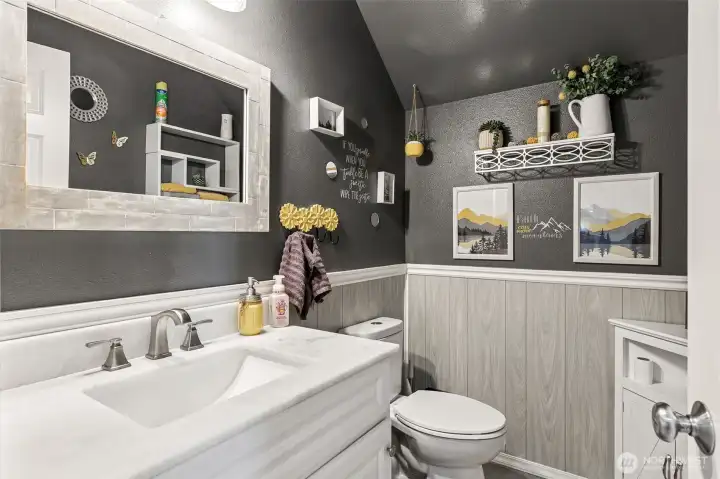 Convenient, easy access main level powder bath