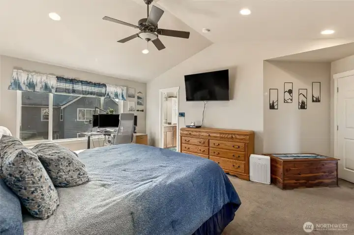 King sized bed and so much more in this oversized primary suite