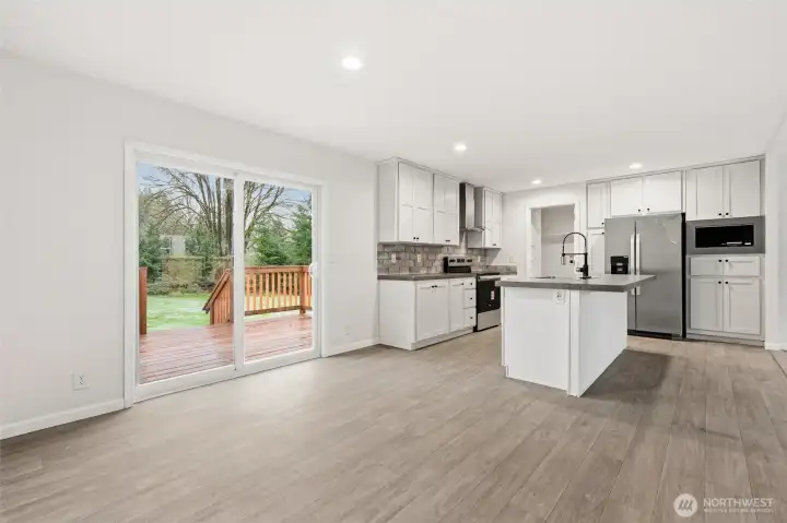 Check out your sizable wood deck to enjoy in the summer months.