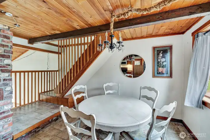 Eating area overlooks large sunken livingroom