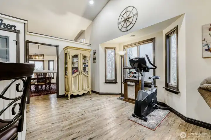 Family room with vaulted ceilings and a lot of natural light.