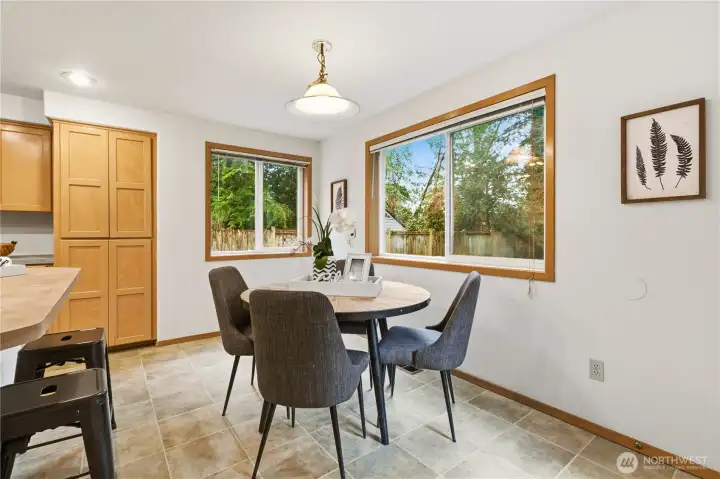 To a bright breakfast nook, perfect for everyday living and entertaining.
