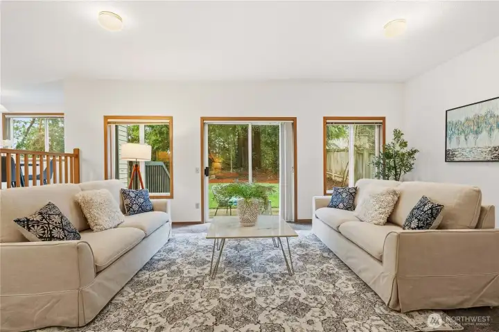 A cozy family room that leads to the big flat yard.