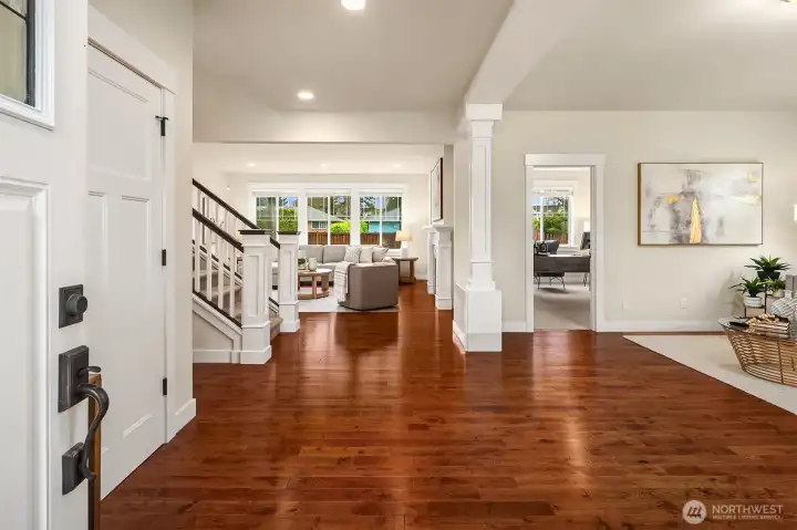 Front door opens to a bright foyer.