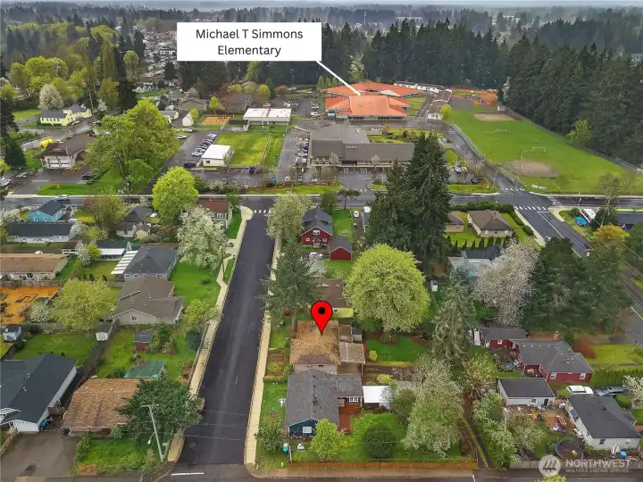Aerial view highlights the property’s convenient location near Michael T. Simmons Elementary.