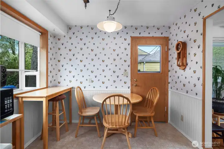 Start your day in this sunny breakfast nook with direct access to the wrap around deck..