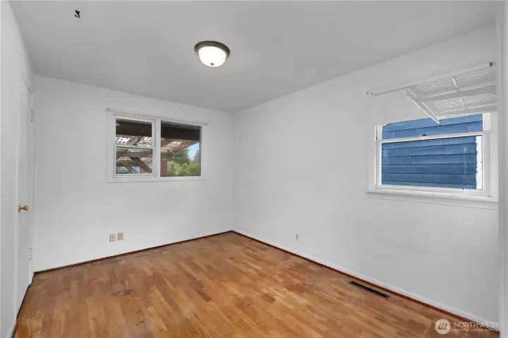 BR 2 with hardwood floors, dual windows, and good natural light.