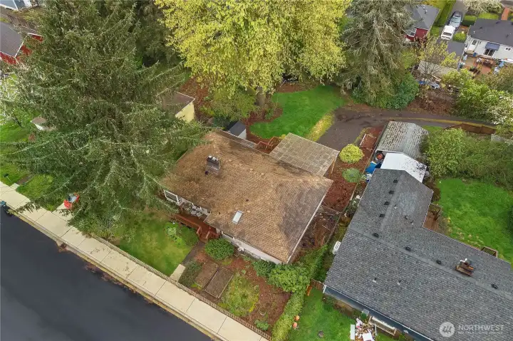 See the full property layout from above, including yard space and rear access.