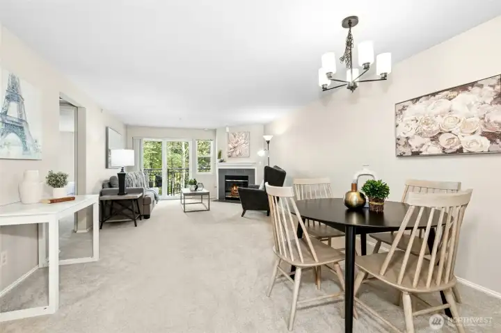 Open concept living and dining area with great natural light.