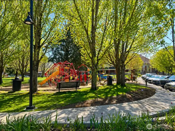 Local park with playground, walking paths, and green space.