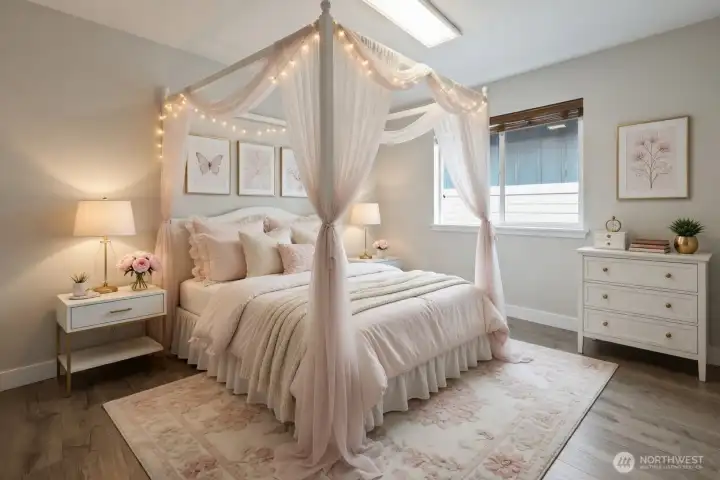 Large window floods the room with natural light, complemented by beautiful neutral finishes, gleaming laminate flooring, and a large closet. A serene and functional space perfect.