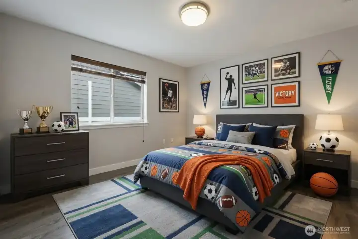 Large window floods the room with natural light, complemented by beautiful neutral finishes, gleaming laminate flooring, and a large closet. A serene and functional space perfect.