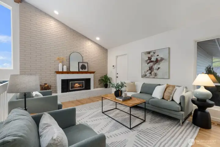 Gas fireplace and feature wall of brick