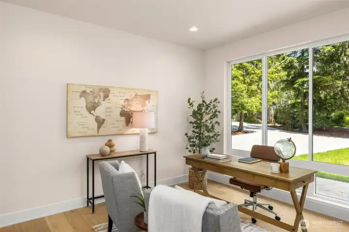 Main floor office or 6th bedroom or studio space with excellent natural light.