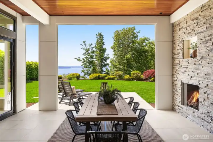 Main floor covered entertainment patio. Gas fireplace, TV plug ready, Built in Gas BBQ