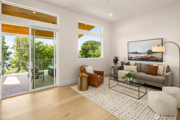 Lounge with wet bar and view deck