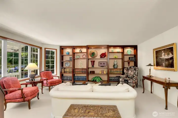 Formal living room with custom built wall unit.