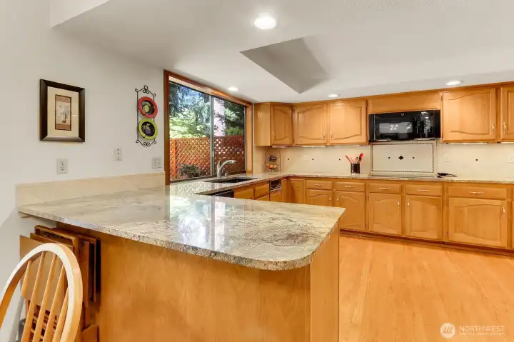Kitchen with breakfast bar.