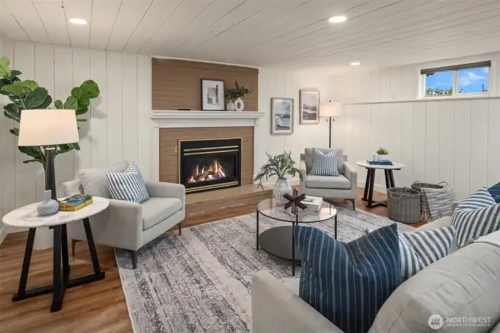 The expansive lower-level living room offers exceptional flexibility, creating the perfect space for movie nights, game days, and gathering with family and friends. With its generous layout, it also presents an ideal opportunity for a private studio or comfortable multi-generational living.