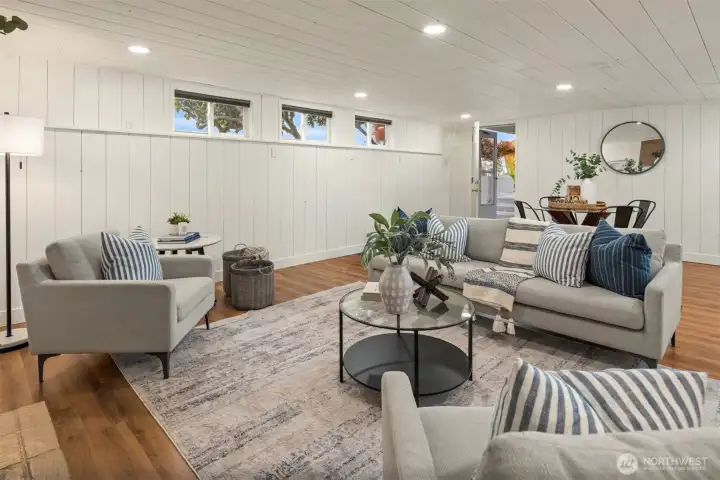 Offering exceptional versatility, this expansive lower-level flex space features its own private entrance, creating endless possibilities for the way you live.