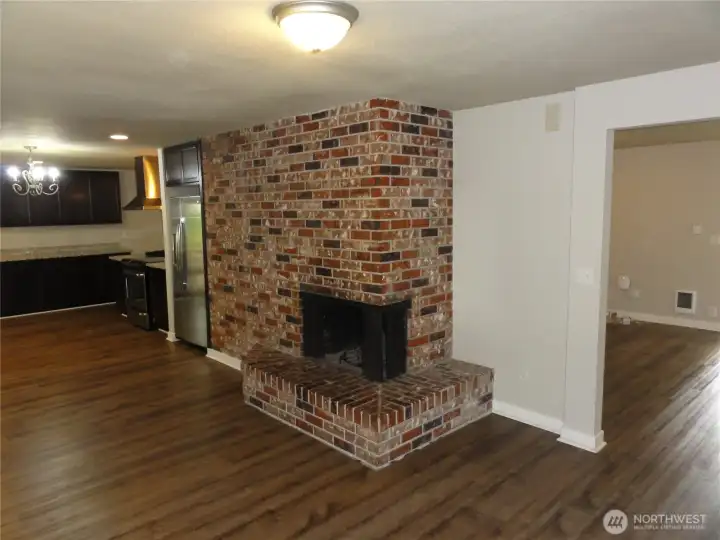 Fireplace off kitchen, great eating area. Fireplace off kitchen, great eating area.