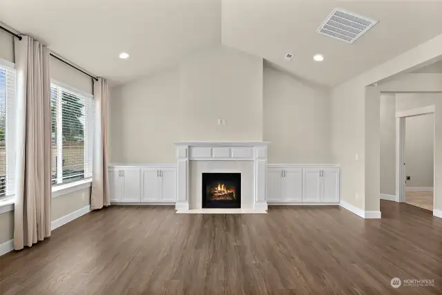 Gas fireplace to snuggle around. Room for your giant TV. Cabinets to tuck away the components, hold your games and photo albums, and CD collection