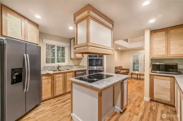 Nice big kitchen with island cook top and a double oven so you can have all the Family for the holidays here!
