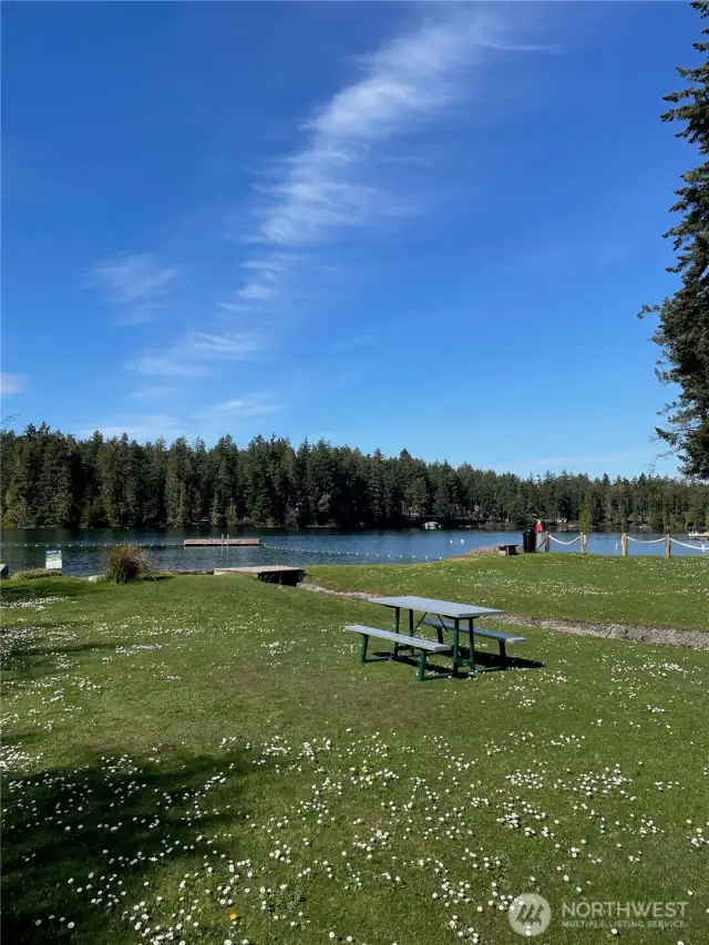 Lovely Park nearby with roped off area to swim and dock to play.