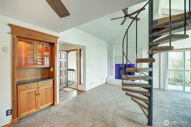 Enter into this spacious unit with gas fireplace and cool loft space