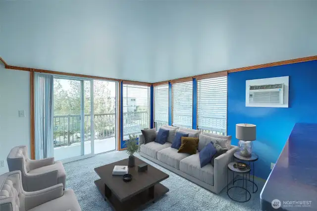 Living room is spacious with access to large view deck