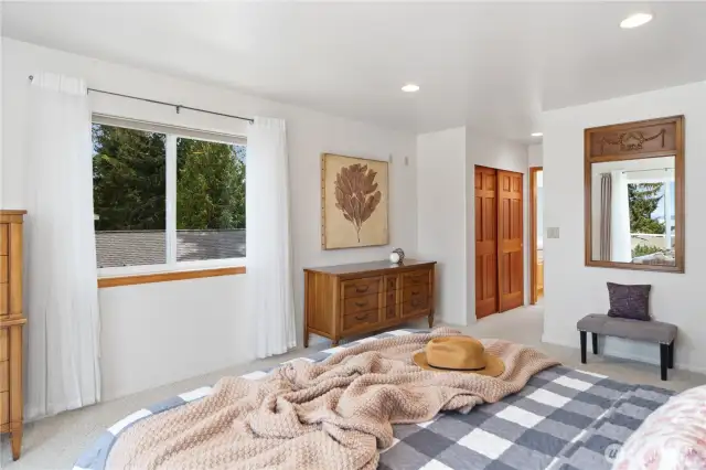 The Primary offers 2 closets, one standard and one walk-in.