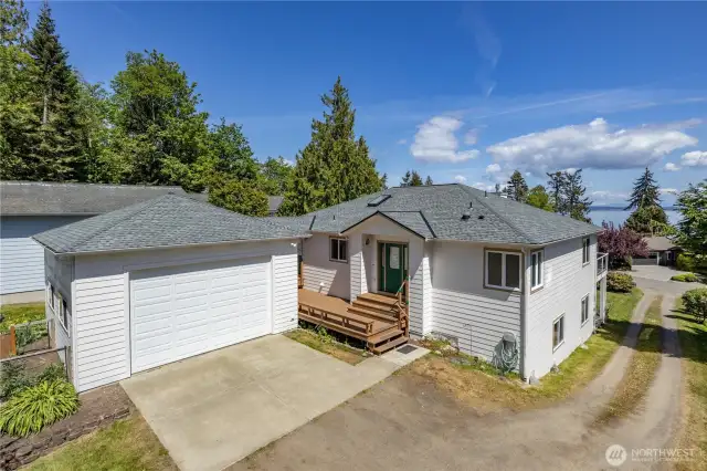 You will enjoy the sun from this private deck with bench-seating.