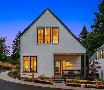 Say hello to neighbors and enjoy evenings on your south facing covered front porch.