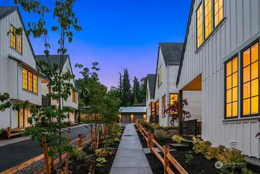The thoughtful landscaping envelopes and enriches each home at Thornton Creek.