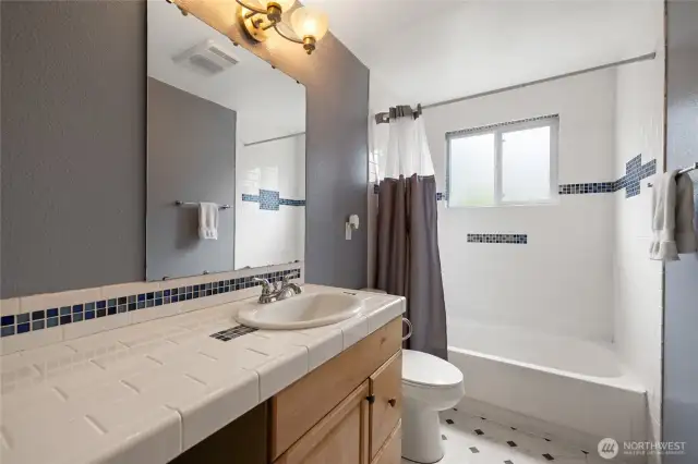 Bathroom with beautiful shower surround and new flooring