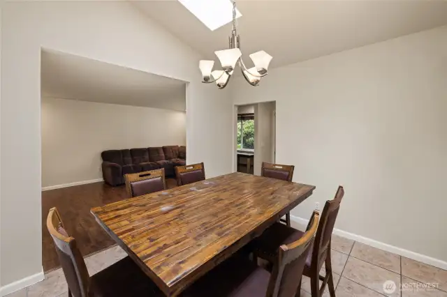 Spacious Formal Dining Room with Tile Flooring