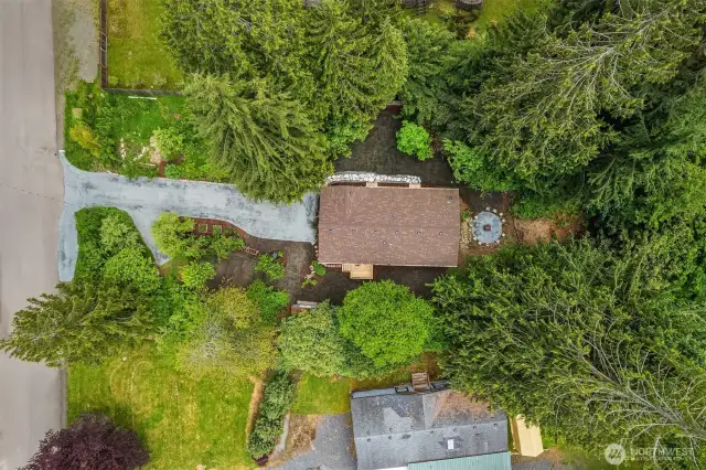 The home is surrounded with a lush private oasis of green!!