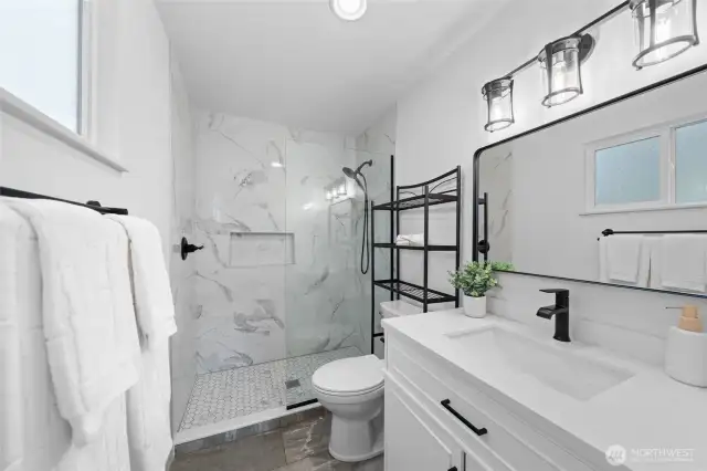 Primary bath with updated tile and fixtures