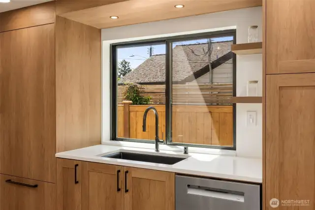 Cabinetry was designed to blend into space, see the details of floor to ceiling design.