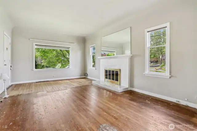 Imagine this with a new floor! Most likely it could be installed over the top of the original flooring.  Coved ceilings could be accented by adding chair rail molding and new paint colors.