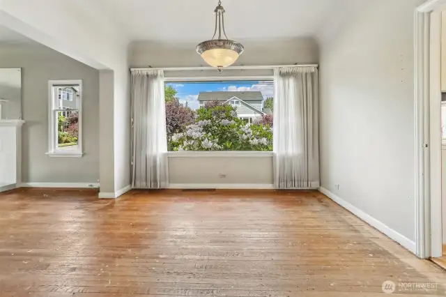 Enjoy the established landscaping from the big picture window.