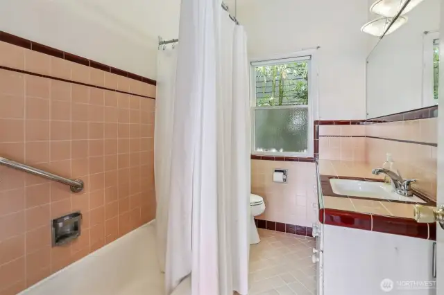Retro tile bathroom on the main floor.