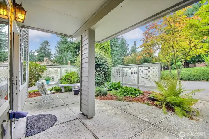 Large patio with bench and privacy fencing. Corner unit for views. Several guest parking spots.