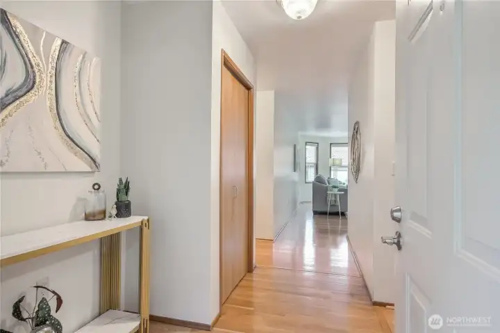 Entry with hardwood flooring.