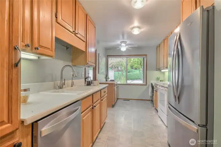 Updated kitchen. Pantry with ShelfGenie pull-outs. Kohler sink w/reverse osmosis water filter under sink.