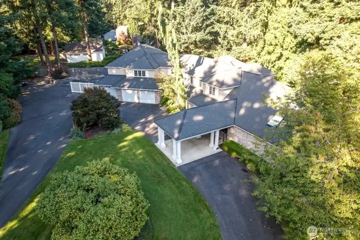 1.24 acres with circular driveway and covered entryway